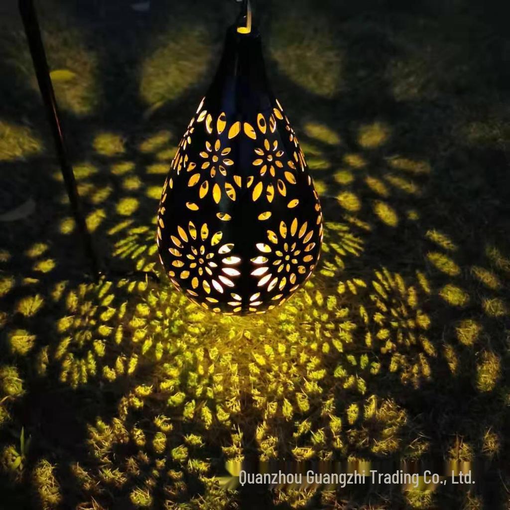 Cross-Border Iron Art Solar Lamp: Hollow Outdoor Courtyard Lawn Projection Light in Water Drop Shape