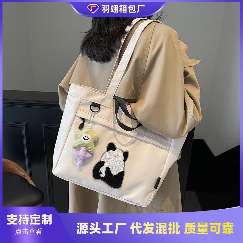 Casual large-capacity shoulder bag women's new fashion handheld cloth bag versatile class tote bag