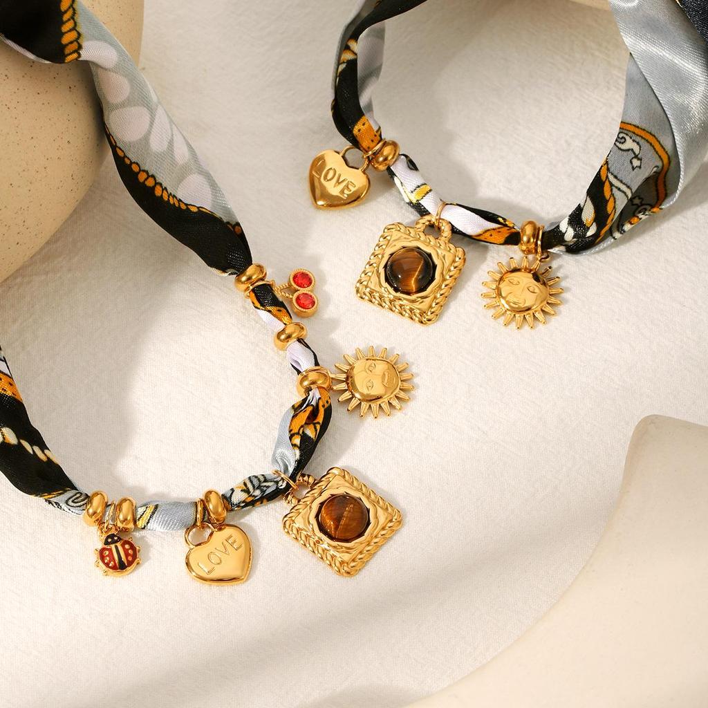 Europejsko-Amerykański Naszyjnik ze Stali Nierdzewnej Serce Słońce i Bransoletka Tytanowa dla Kobiet - Akcesoria Luksusowe