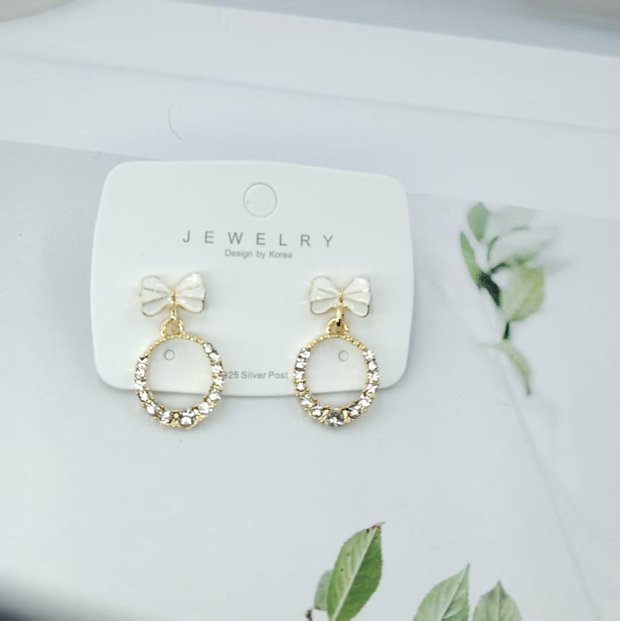 Elegant Rhinestone Bow Earrings for Women - Hollow, Round Design
