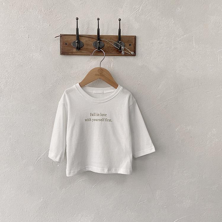 

Korean Autumn Family T-Shirts: Simple Letter Long Sleeve Casual Tops for Men, Women, and Kids, with Round Neck Base Layer Design. 100cm
