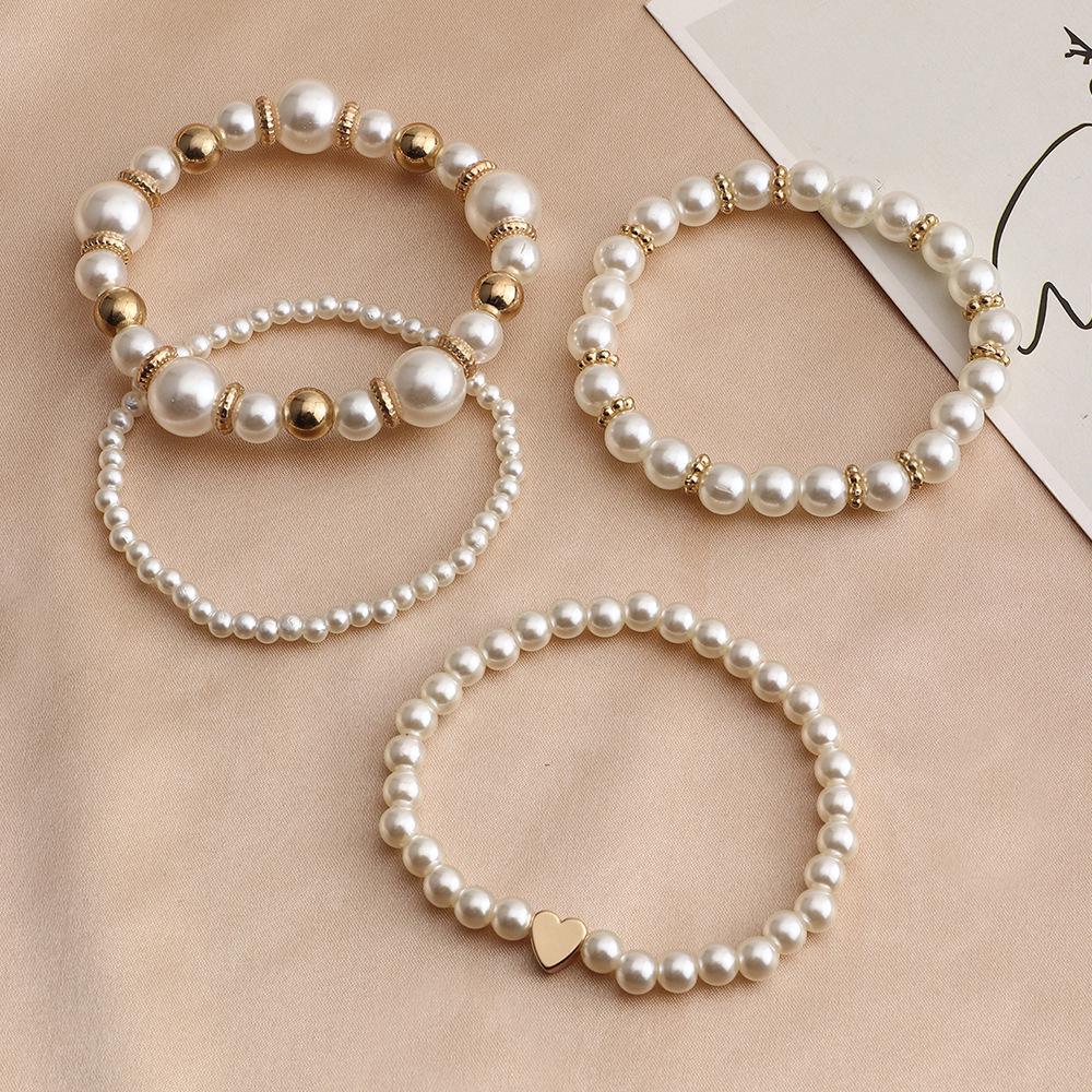 Elegant Pearl Heart Bracelet: Naju BZ1365 European & American Fashion