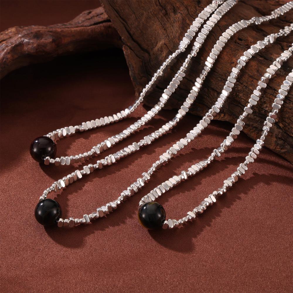 Minimalistyczny koreański naszyjnik z zawieszką z tygrysiego oka z łączonym srebrem próby 925 i designem ze stali tytanowej