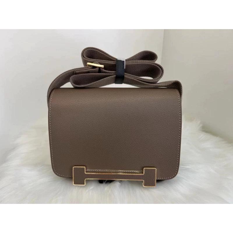 2025 New Leather Women's Bag Goat Pattern Leather Men's and Women's Same Clogs Wide Shoulder Strap Epoxy Leather Color Buckle Cross-border Wholesale