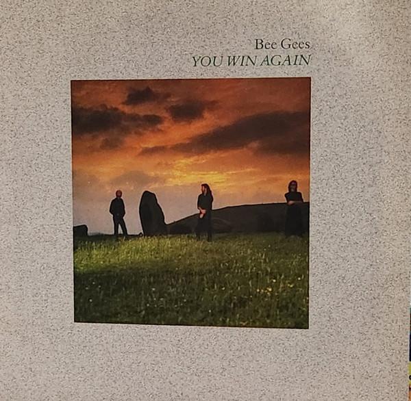 

7-дюймовая пластинка BEE GEES You Win Again Backtafunk 928351 Warner Bros. Б/у 1987 US Dance Electronica