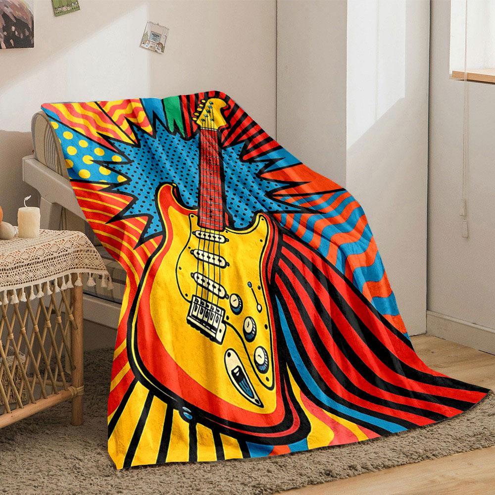 Pop art guitar surrounded by bold patterns, polka dots, and vibrant waves. for all seasons blanket lunch break throw gift
