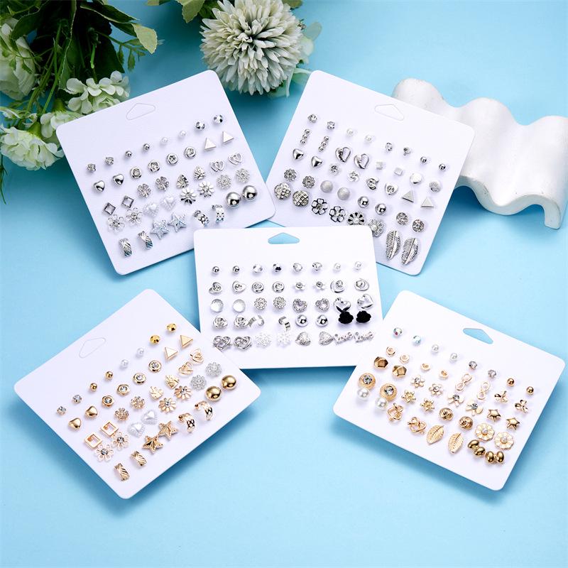 European & American Gold Fashion 12-Pair Rhinestone Stud Earring Set: Hearts, Feathers, Figure 8, Stars