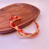 Luxury-lite Plastic Bracelet with Curved Metallic Texture, A Unique Design for Fashionable Jewelry.