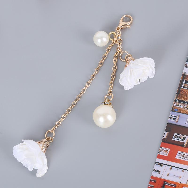 Handy-Lanyard mit Diamantenbesatz, Blumenanhänger und Quaste