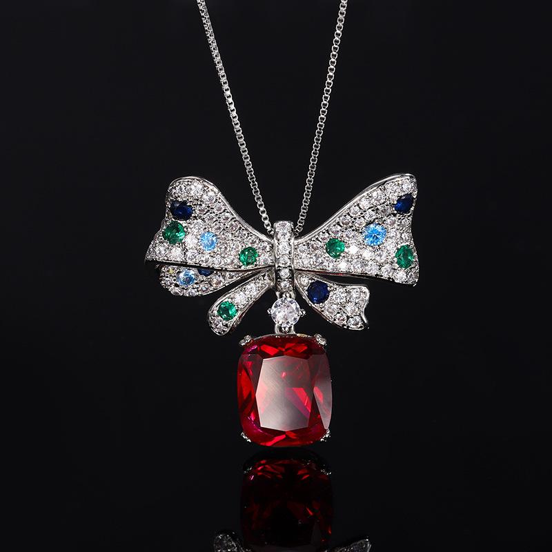 

Jewelry Copper Bottom Gold Plating Trend Line Simulation Red Corundum Bow Necklace Main Stone 12 * 14