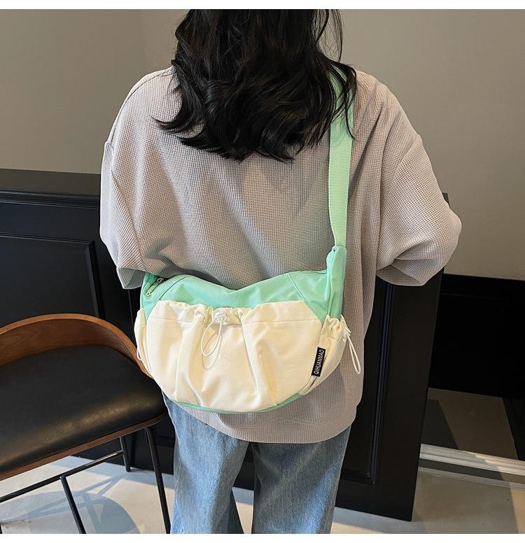 

Casual small bag women s bag 2025 new simple canvas shoulder messenger bag pleated lightweight dumpling bag women бирюзовый