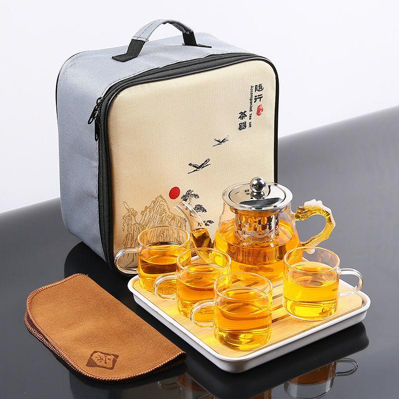 Juego de té chino Gongfu portátil Tetera de vidrio de borosilicato resistente al calor Bandeja de té Juego de tazas de té Una tetera de cuatro tazas Bolsa de regalo