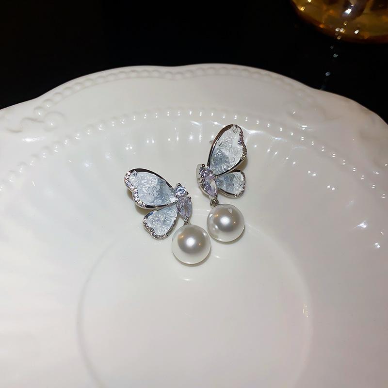 

Серебряные иглы, бабочки, циркониевые жемчужные серьги, французские модные маленькие свежие темпераментные серьги, нишевые серьги высокого класса