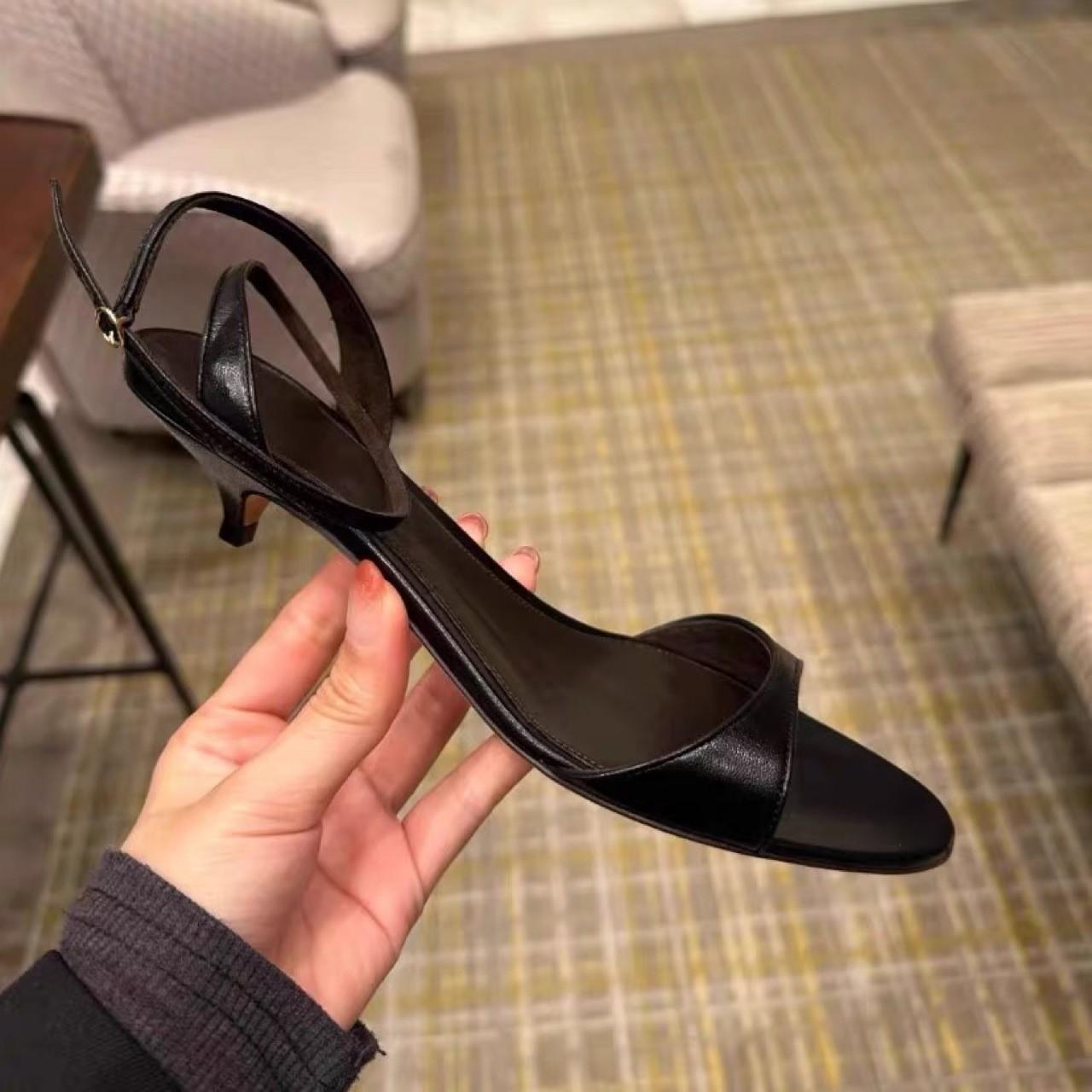 

Niche leather cat heel sandals women s 2025 new French retro one-word strap high heels stiletto open-toed women s sandals 40