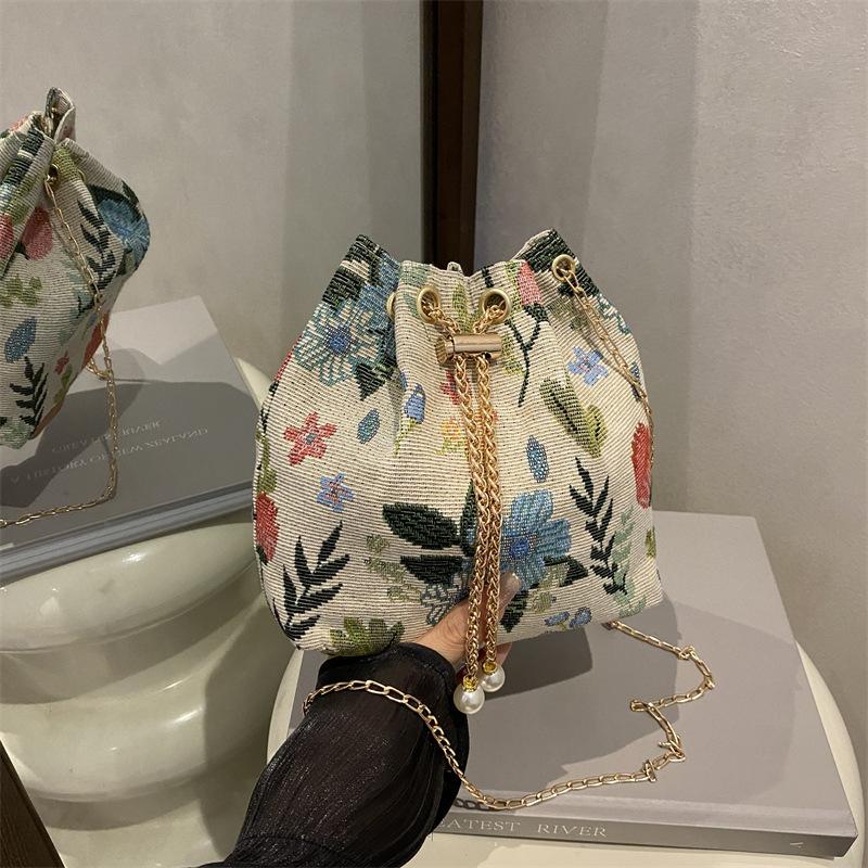 

Popular printed women s new nylon canvas texture commuter chain shoulder crossbody bucket bag зелёный