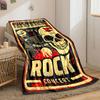 A rock concert poster with bold skull, flames, and musical motifs. for all seasons blanket lunch break throw gift