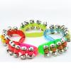 1PC Kunststoff Musikinstrumente Spielzeug Farbe Halbkreis Hand Glocke Haut Fünf Glocken