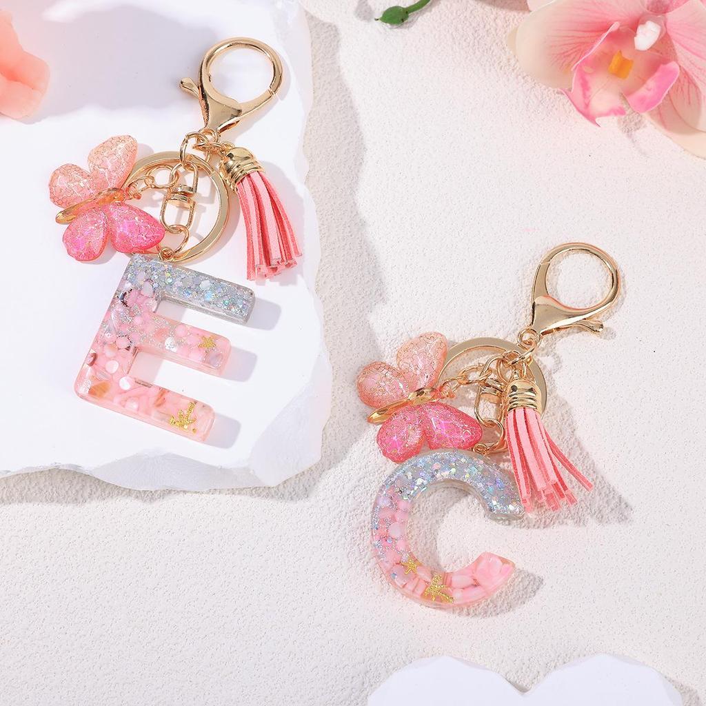 Pink Epoxy Letter Keychain with Sequin Butterfly & Tassel Charm