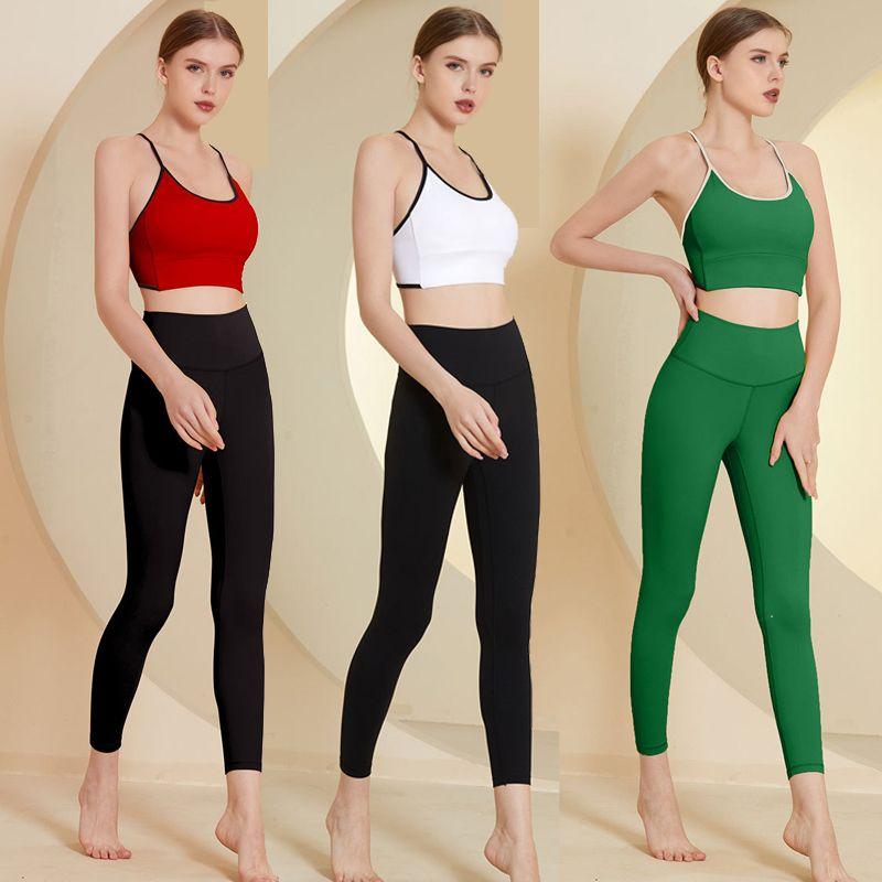 Fashion Fitness Yoga Suit Women's New Arrival Contrast Color Cross Backless Bra Seamless Yoga Sports Pants Two-piece Set