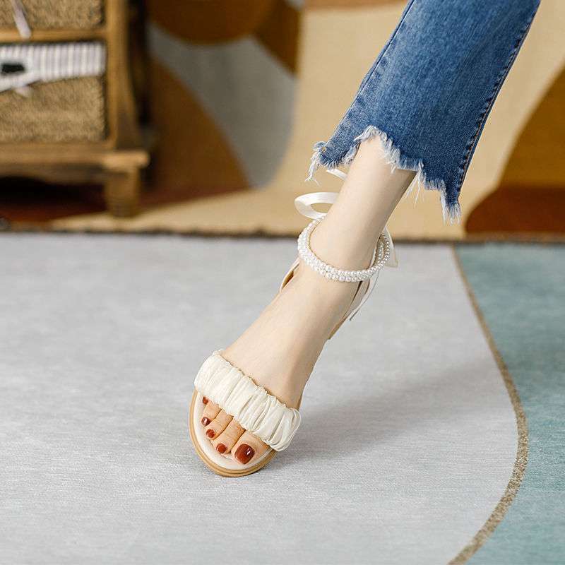 Sandals women's outer wear 2025 summer new versatile ins bow fairy style flat sandals non-slip maternity sandals