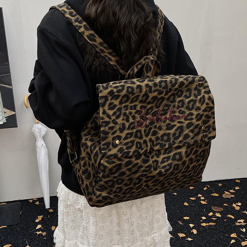 Leopard print backpack women's fashion niche design sense student class bag canvas retro tote bag travel backpack