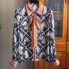 2025 Autumn New Heavy Lapel Button Fashion Printed Ribbon Long Sleeve Design Shirt