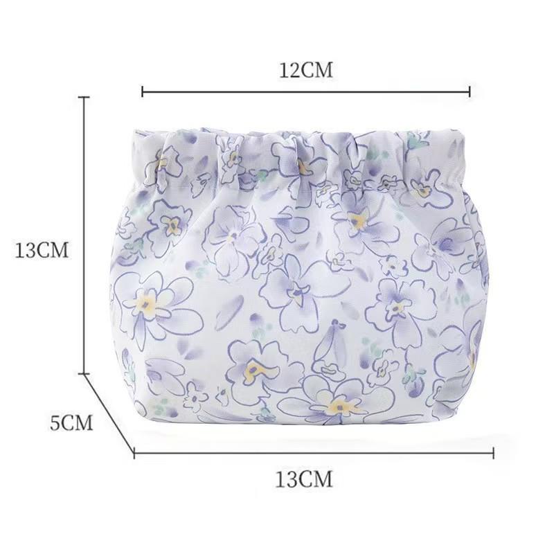 

Waterproof Portable Lipstick & Coin Purse: Fashionable Printed Cosmetic Bag with Automatic Closure