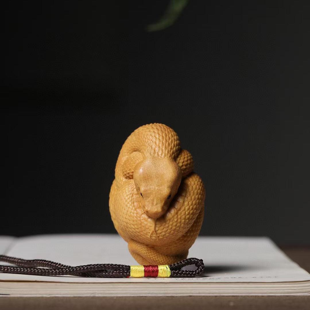 

Golden Sandalwood Pan Snake Hand-Held Ornament Wood Carving Pendant Car Decoration Craft 6.5*4.2*3.9 cm