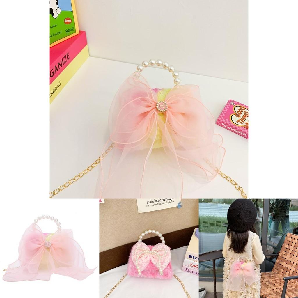Lovely And Eye-catching Pearl Handled Bowknot Purse For Kids In Soft Pink For Daily Wear