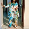 Women Plus Size Two Piece Coordinated Outfit Round Neck Three Quarter Sleeve Irregular Hem Top Printed Wide Leg Trousers