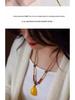 Elegant Handmade Amber Gold Pendant Necklace with Eight Treasures Compass Safety Buckle and Jade Pendant Rope