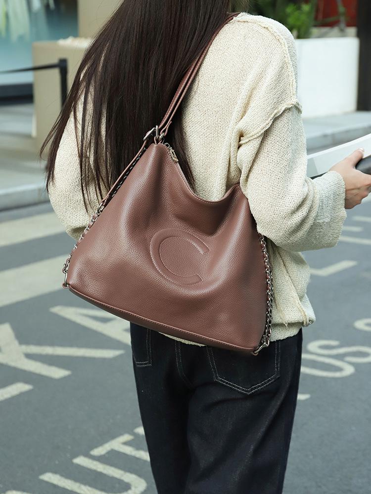 

2025 Autumn/Winter Women s Large Capacity Tote: Top Layer Cowhide Embossed Shoulder Bag 35x12x28 CM фиолетовый
