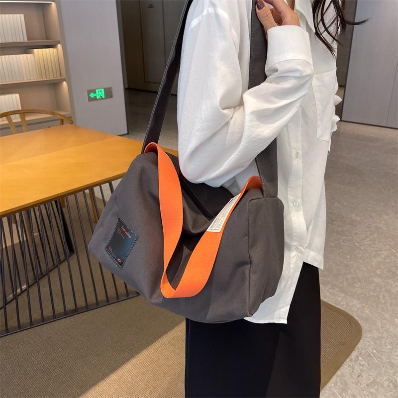 

Large Capacity Women s Canvas Bag: 2025 Summer Casual Versatile Shoulder & Crossbody Dumpling Bag