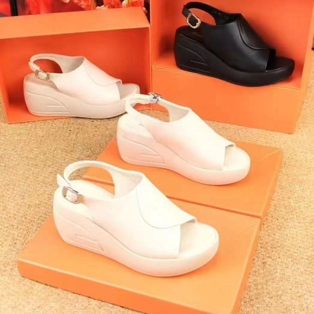 2025 summer new real soft leather slope heel cool slippers women wear fashion Internet celebrity muffin thick bottom one word cool slippers