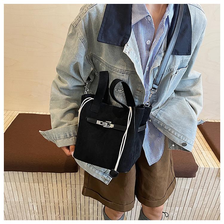 Suede bag women's autumn and winter new niche shoulder messenger bag matte retro portable bucket bag