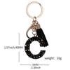 Black Resin Keychain with English Letter Pendant and Tassel