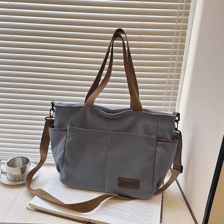 Spacious Canvas Shoulder Bag For Women In Stylish Minimalist Urban Design Ideal For Casual Travel