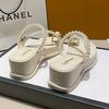 Design sense niche high-heeled sandals new wedge heel cover toe wear slippers fairy thick bottom French one-word
