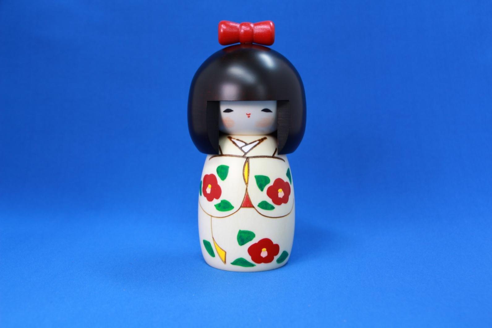 Popular as a souvenir from Japan. [Made in Japan] Folk craft, handcrafted item, Kokeshi doll with ribbon, made by Usaburo.