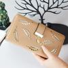 Youthful Embossed Long Wallet: Three-in-One Coin Purse, Anti-Magnetic, Multi-Card Slot Holder, with Elegant Cutout Design.