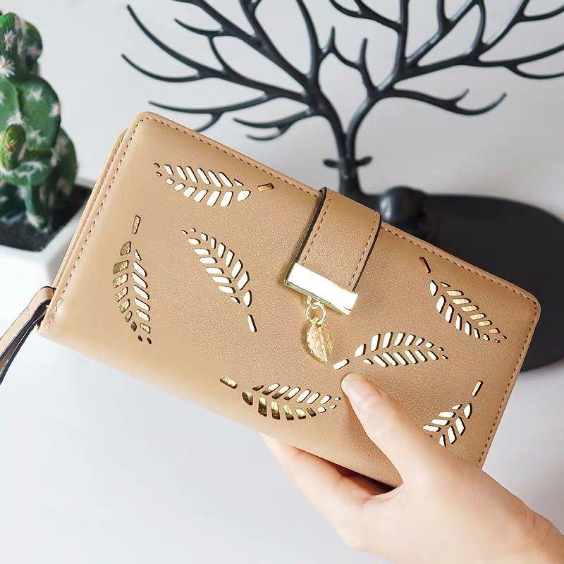Youthful Embossed Long Wallet: Three-in-One Coin Purse, Anti-Magnetic, Multi-Card Slot Holder, with Elegant Cutout Design.
