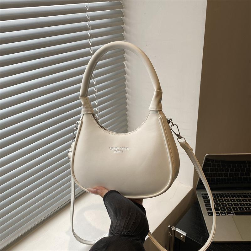 

New portable crescent bag women s fashion sense armpit bag casual simple commuter shoulder women s bag белый