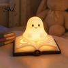 Ghost Figurine Desk Lamp Magic Book Night Light, Resin Tabletop Warm Glow with Moon Cute Light Star Relief, Bedside Sleeping for Kids Bedroom,