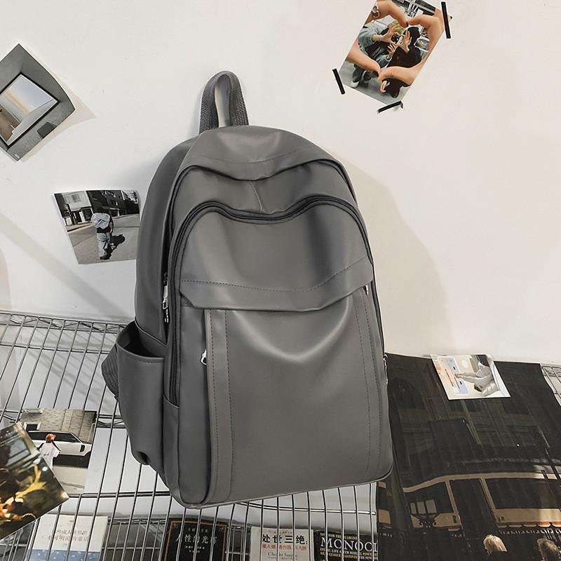 Solid Unisex Backpack Color Pu Material With Padded Straps For School And Trips