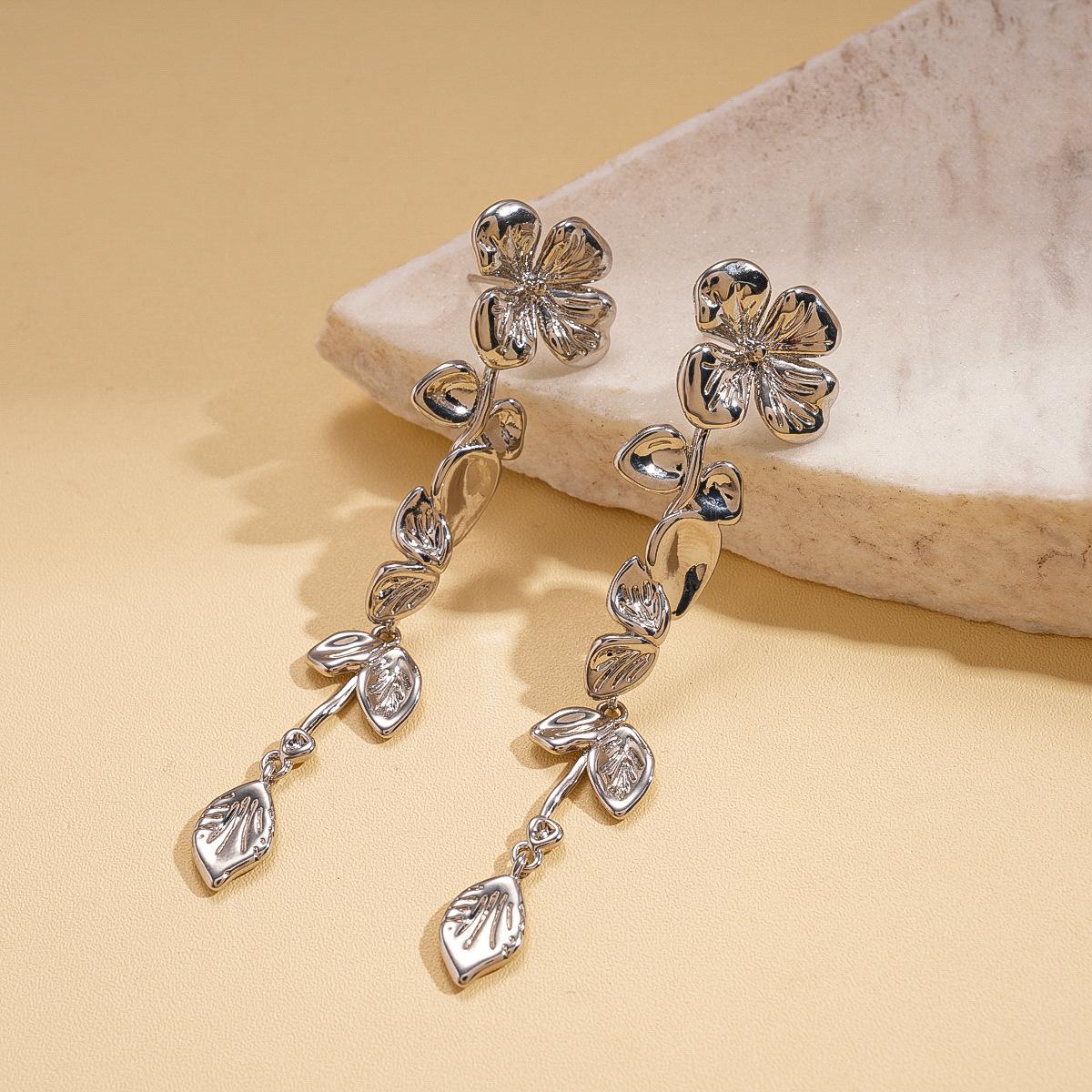 Metallic flower leaf pleated texture silver needle earrings cold wind personality niche earrings