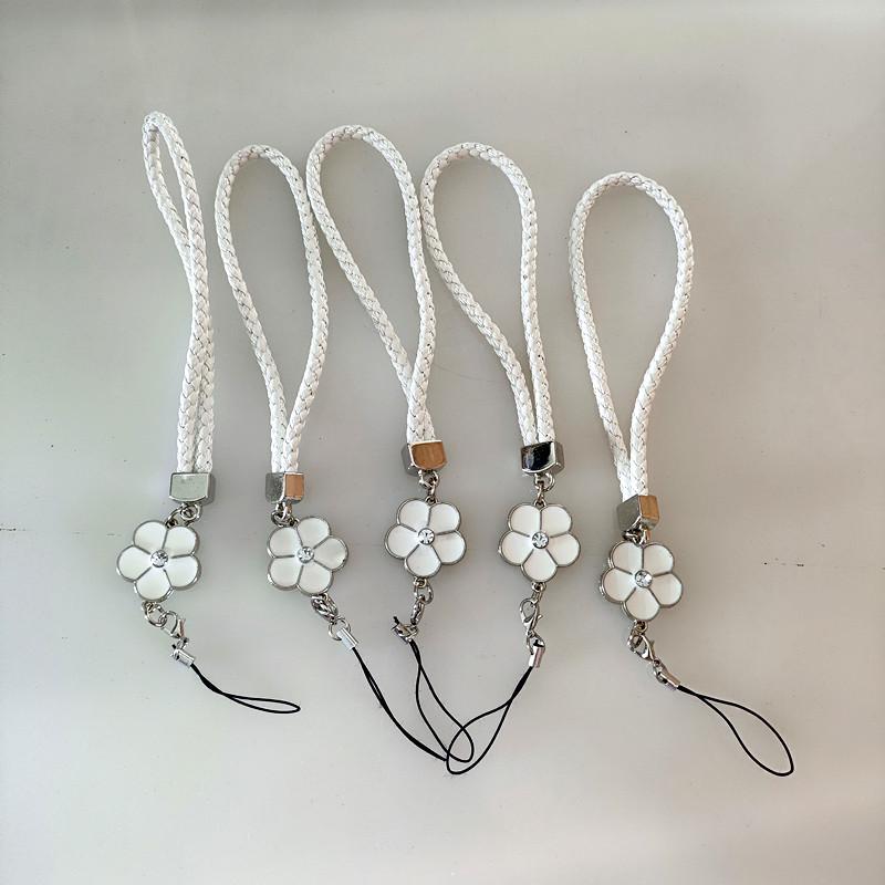 Camellia Four-Leaf Clover PU Leather Phone Wrist Lanyard with Nylon Woven Cord and Phone Case Pendant