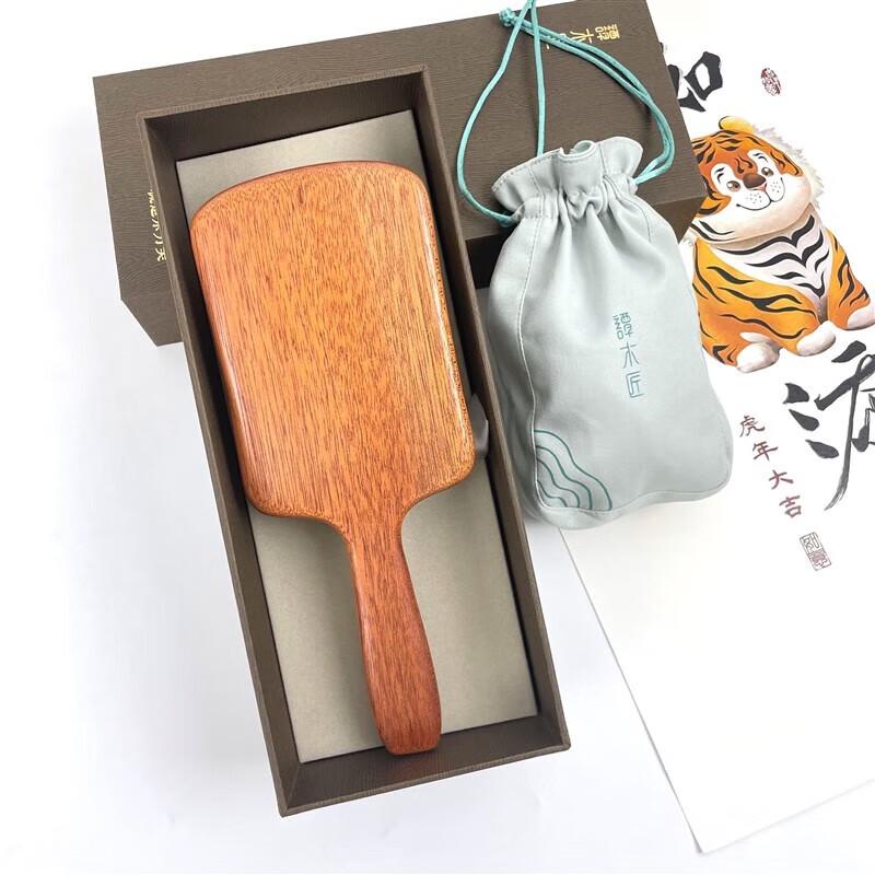 

Tan Mujiang Airbag Massage Hairbrush