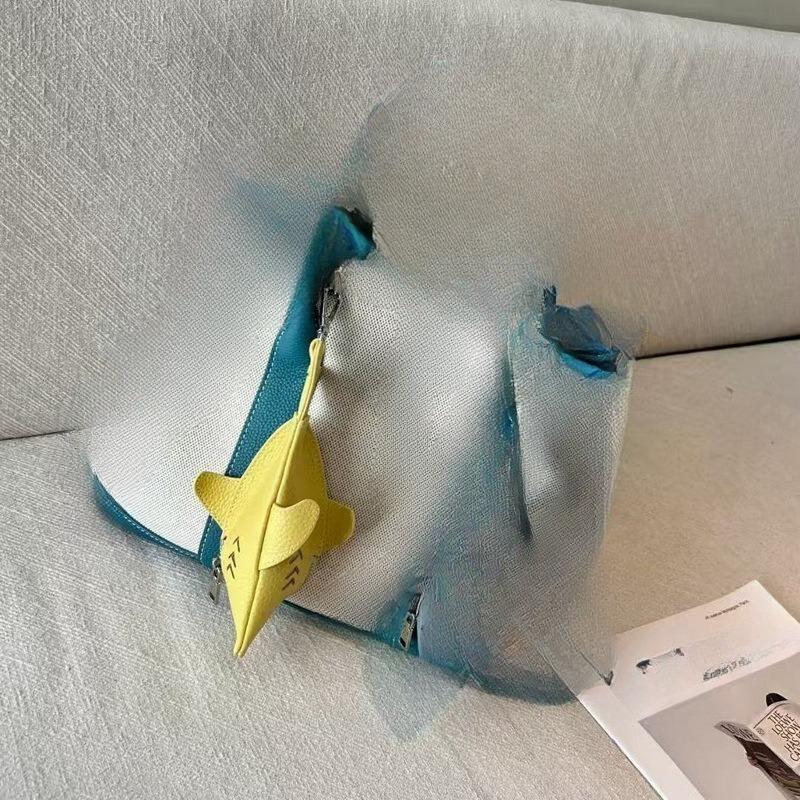 New leather dolphin change bag, keychain pendant, cute fashion earphones, lipstick storage bag.