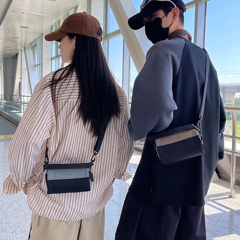 Pendler-Mode trendige Marke Reisetasche Umhängetasche Stiftehaltertasche Damen Koreanische Version tragbare Messenger Bag lässige Handytasche