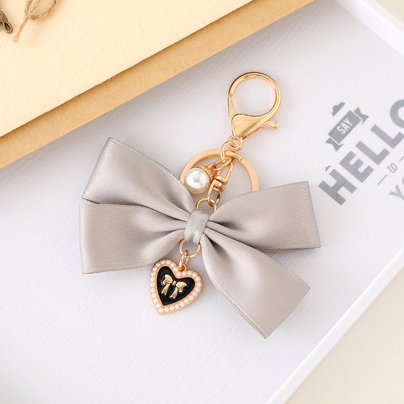 Creative Pearl Bow Pendant Keychain: Exquisite Gift Accessory for Bag or Phone Case